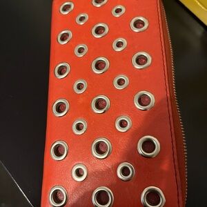 Fossil Used Red Wallet with Silver Grommets